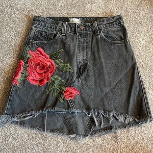 Vintage black skirt with sewed on flower detail